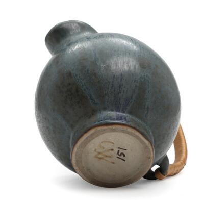 Arne Bang: A round stoneware pitcher modelled with fabulous