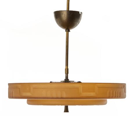 Ceiling lamp with patinated brass stem. Three lights. Shade of patterned, frosted amber-coloured glass. Manufactured in the 1920–1930s. H. 40 cm. Diam. 40 cm.