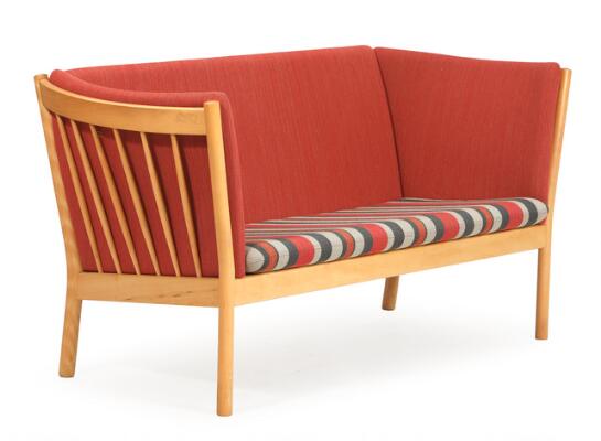 A two-seater beech sofa with loose cushions upholstered with reddish and striped wool. Model J48. Manufactured for FDB. L. 150 cm.