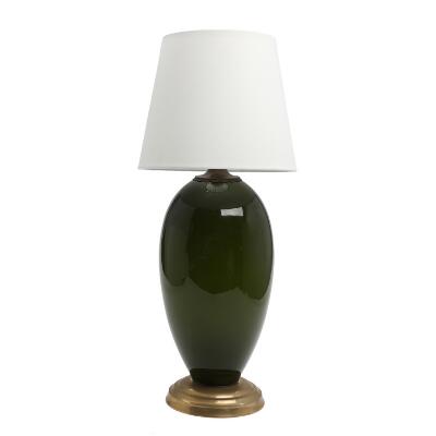 Table lamp in green glass with brass fittings. Prototype, Kastrup Holmegaard glassworks. 1940s–50s. H. 43 cm including fitting.