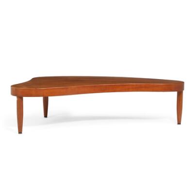 Large teak coffee table with organically shaped top. Manufactured ca. 1950s. H. 47 cm. L. 184 cm. W. 90 cm.