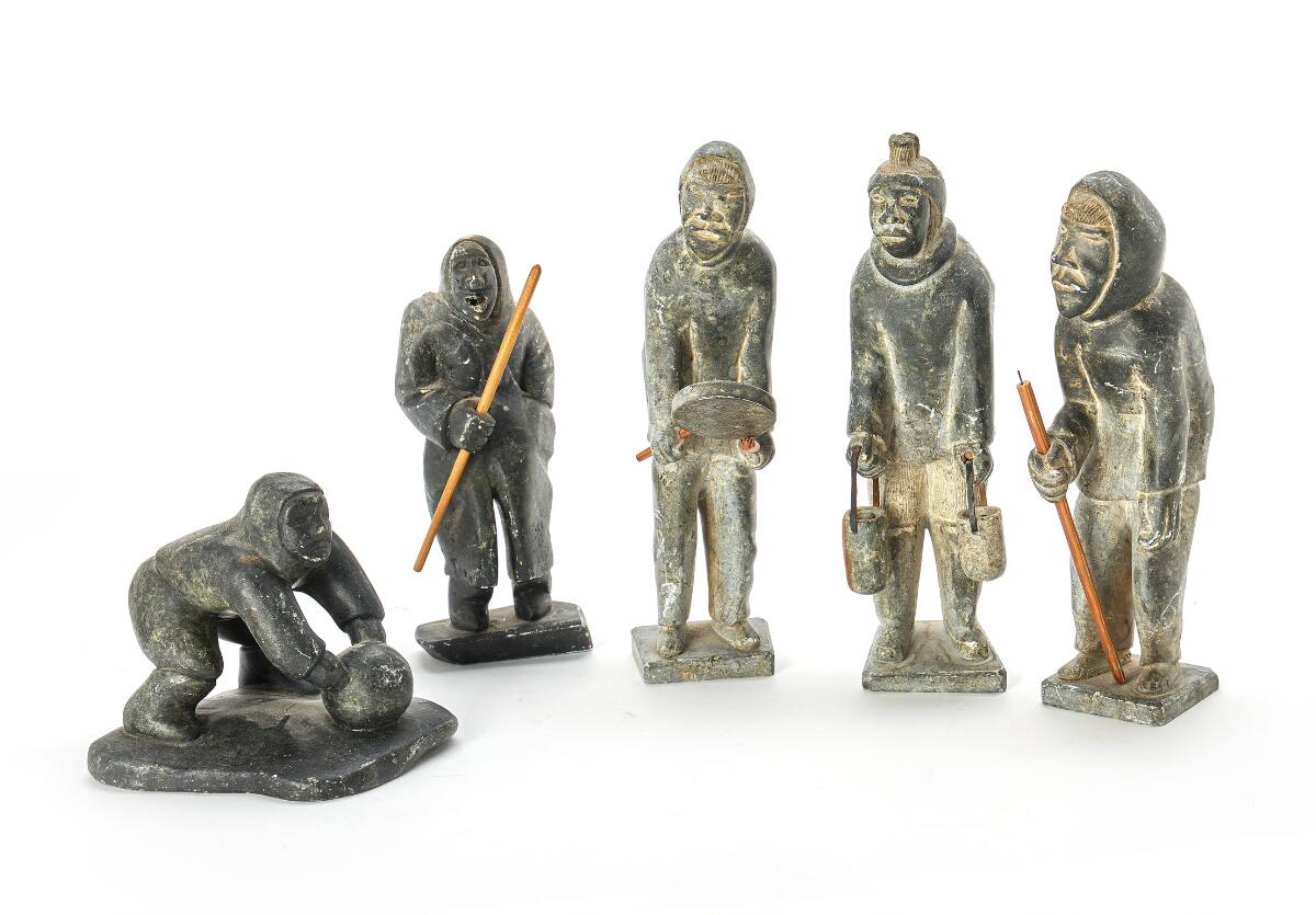 Karl Petrussen, et al: Five Greenlandic figures of carved soapstone. H. 13–27 cm. (5) — Ethnographica — Bruun Rasmussen