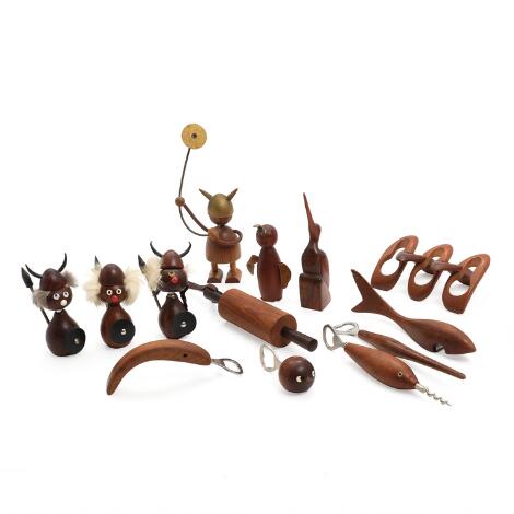 Danish design: A collection of ten teak and rosewood openers in the shape of animals and vikings, and two figures and a pipe rest. 1960's. (13)