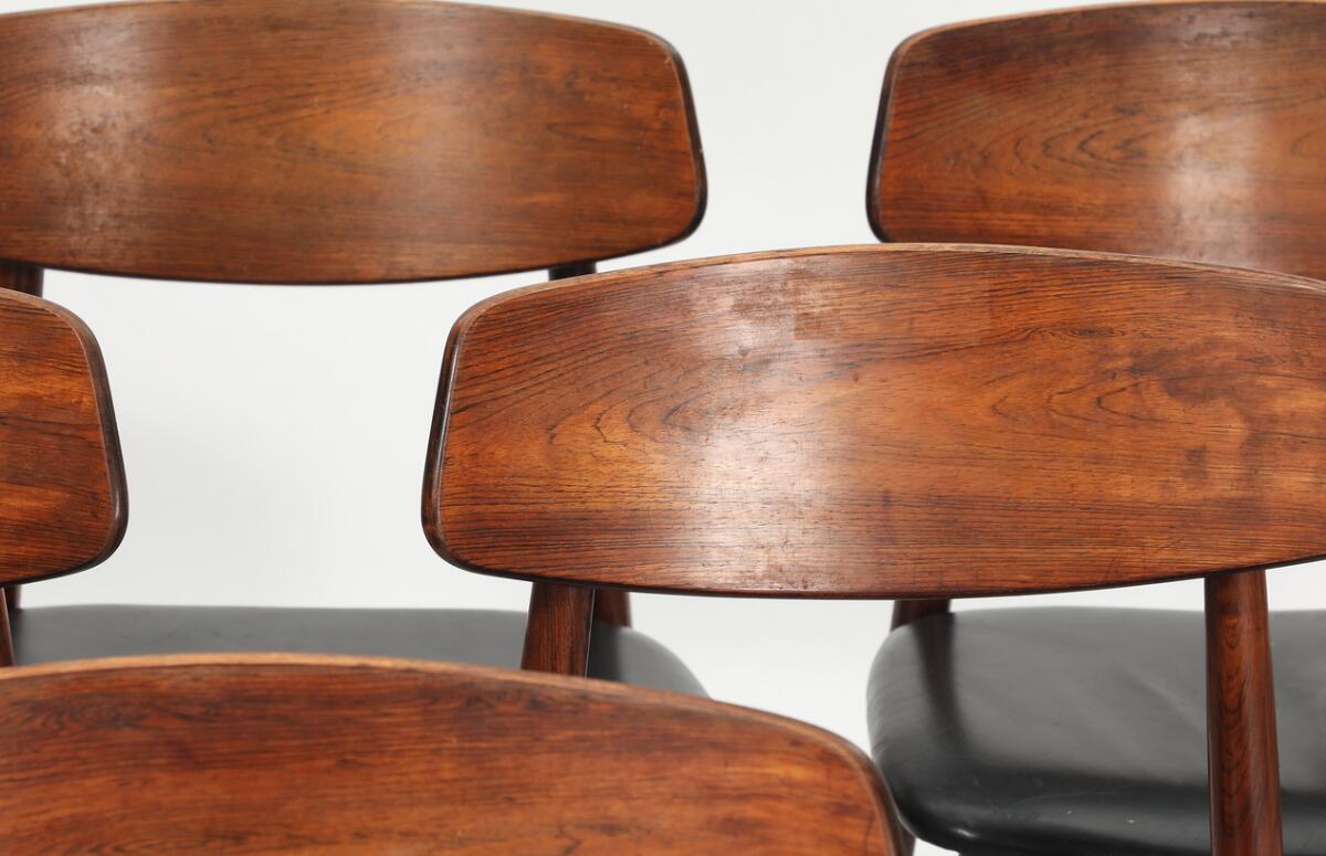 Harry Østergaard: A set of six chairs in rosewood with original