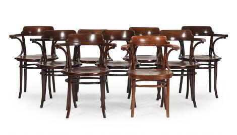 Michael Thonet: Set of nine armchairs with stained beech frame. Plywood seat. Model 233. Manufactured by and marked by Thonet. (9)
