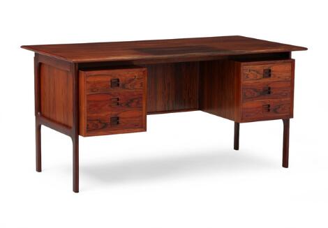Edmund Brouer: Freestanding rosewood desk with floating top. Manufactured by Brouer Møbelfabrik, 1960s.