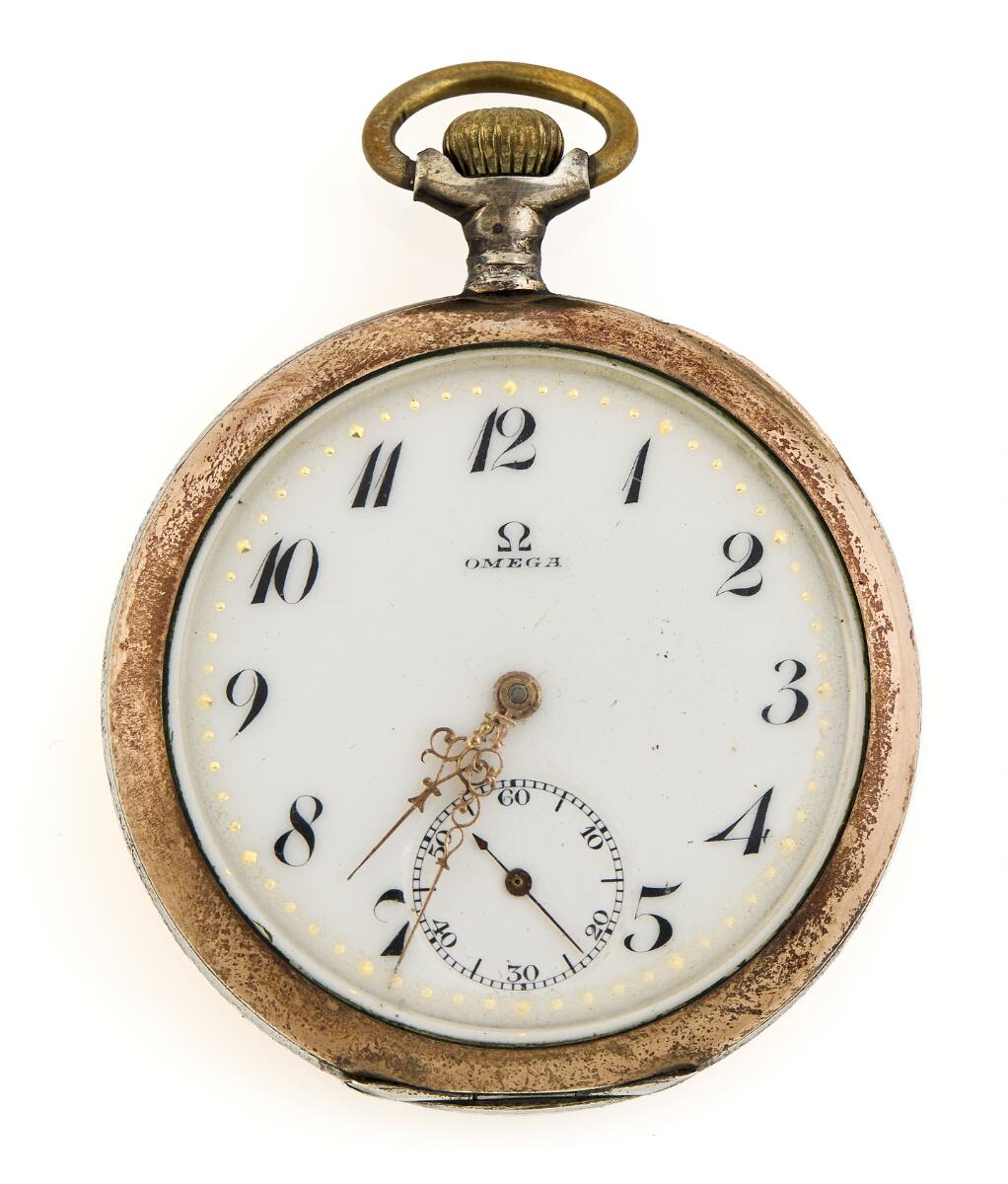 Pocket watch of silver. Mechanical movement with lever escapement, crown winding and crown setting. White enamel dial with gilt hands and Arabic numerals. Dust cap of silver. Ø 52 mm.