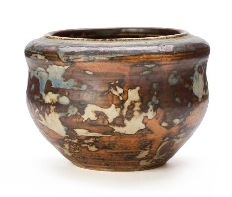 Kgl. P.: A circular bowl of stoneware, decorated with Sung glaze. Royal Copenhagen. H. 10 cm.