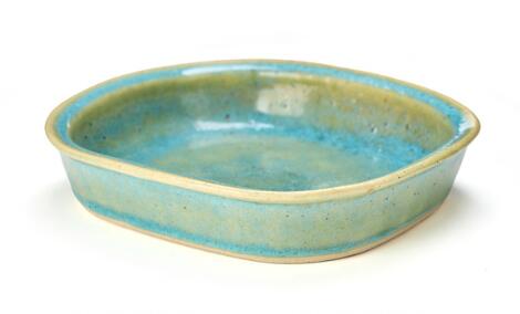 Christian Poulsen: A stoneware dish modelled in a slightly oval shape. Decorated with a light turquoise-blue glaze. Unique.