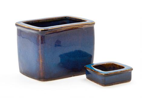 Christian Poulsen: A stoneware four-sided vase and small bowl. Decorated with blue-violet glaze. Unique. (2)