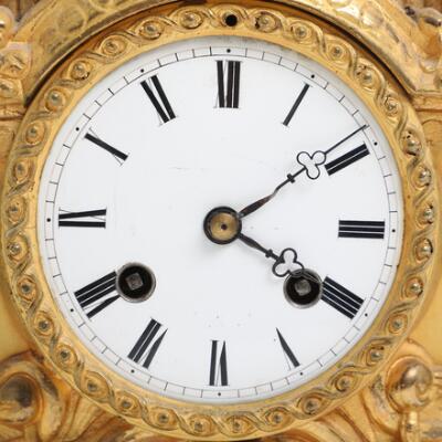 French gilt metal mantel clock, surmounted by a noblewoman. G.F.
