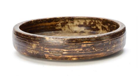 Patrick Nordström: A large stoneware bowl decorated with brown and grey glaze. Signed monogram, 1925, ISLE. Unique. H. 7 cm. Diam. 30 cm.