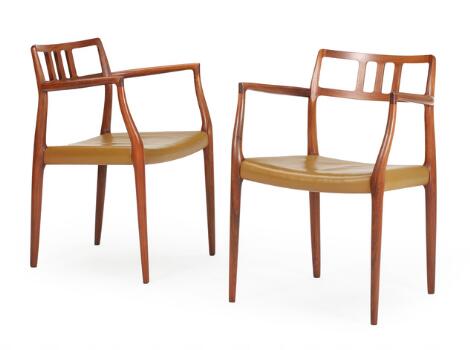 Niels O. Møller: A pair of armchairs with rosewood frame. Model 64. Designed 1966. Manufactured and marked by J. L. Møller. (2)
