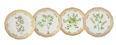 'Flora Danica' four enamelled and gilt porcelian lunch plates. Royal copenhagen. (4)