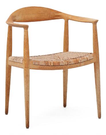 Hans J. Wegner: “The Chair”. Oak armchair. Seat with woven cane. Model JH 501. Designed 1949.