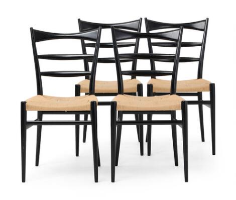 Italian design: Set of four chairs in black lacquered wood. Seat with woven paper cord. (4)