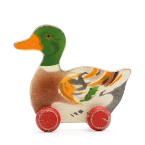 LEGO: A painted beech duck on four wheels. Model 213/2. Manufactured by LEGO, 1937-40. L. 14 cm.