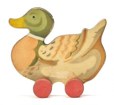 LEGO: A Paint wood duck on wheels. L. 19 cm.