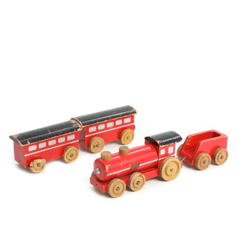 LEGO: Painted beech train with coal wagon and passenger cars. LEGO. No. 410. L. app. 50 cm.
