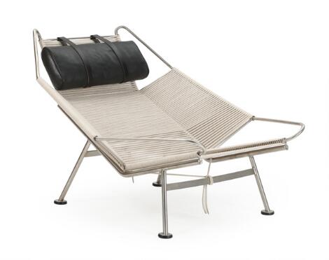 Hans J. Wegner: “The Flag Halyard Chair”. Easy chair of steel. Seat, sides and back with flag halyard. PP Møbler.