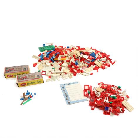 LEGO: "LEGO system" a.o. Two boxes no. 1235 and a collection of various plastic bricks, including doors, windows and signs. (4)