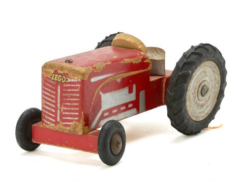 LEGO: Tractor of painted wood. L. 17 cm.