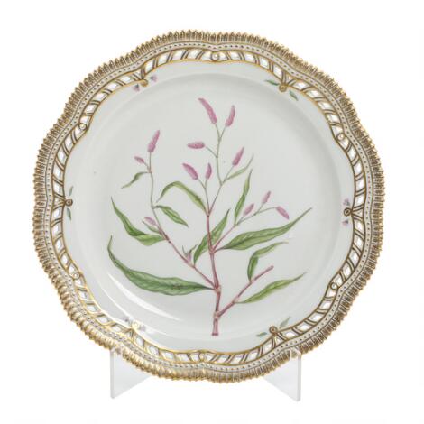'Flora Danica'. An enamelled and gilt porcelain dish with pierced rim. Royal Copenhagen. Diam. 33 cm.