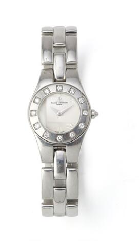 Baume & Mercier: Linea of steel, ref. MOA08135/65338. Quartz movement with diamonds on bezel, approximately 0.41 ct., cal. 5057. 2000s.