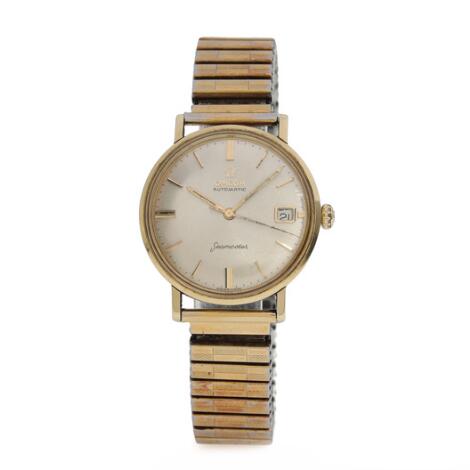 Omega: Seamaster of partially gold-plated steel. Mechanical movement with automatic winding and date indication.