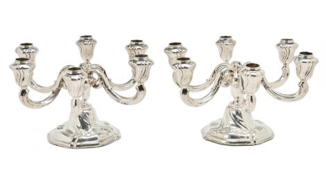 A pair of silver candelabra, each with six curved light arms. 835S. Denmark, 20th century. Filled. H. 17 cm Diam. 30 cm. (2)